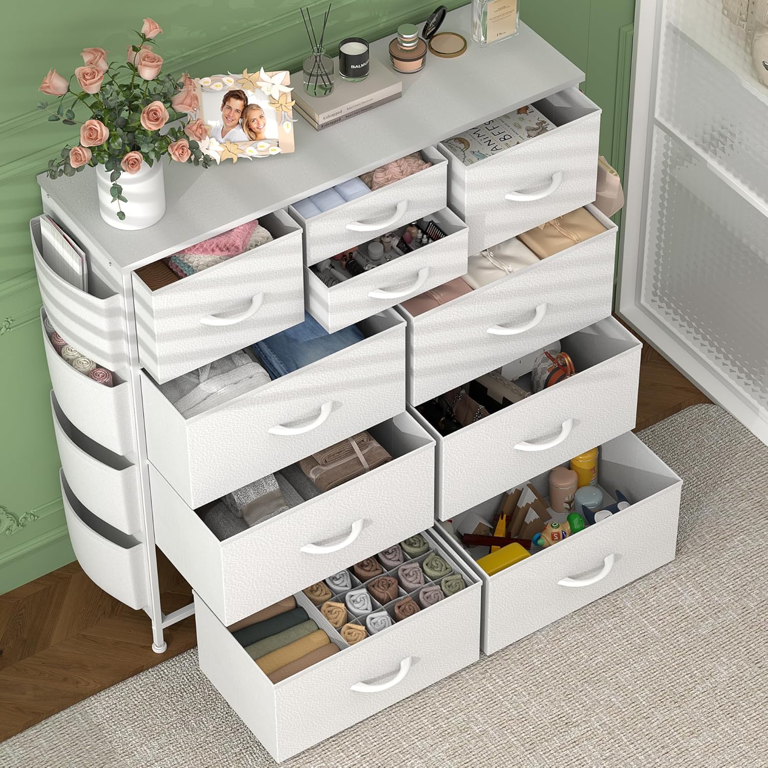 Top-down view of a white 12-drawer fabric dresser organized with clothing, socks, accessories, and bedroom decor.