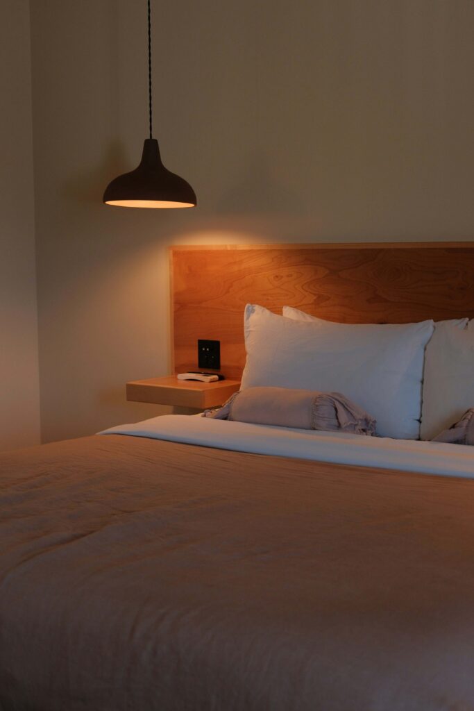 Cozy and relaxing bedroom environment with soft lighting and warm blankets