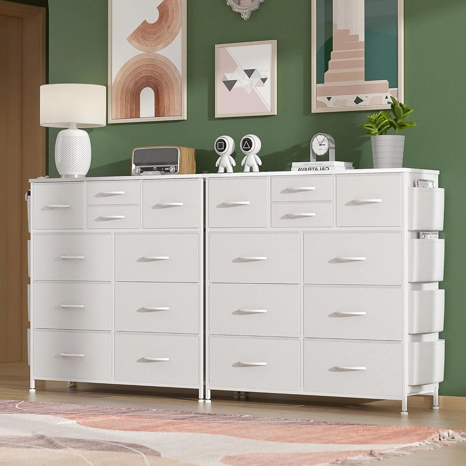 Modern white 12-drawer dresser in a cozy green bedroom setup with decorative frames and lamp.